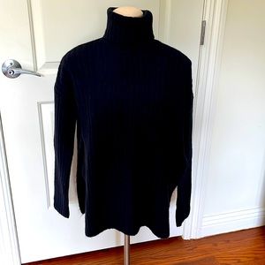 Cozy turtle neck sweater perfect for work, a night out or every day wear.
